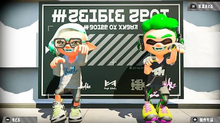 A player Inkling poses with the figure from an Inkling Boy amiibo figure