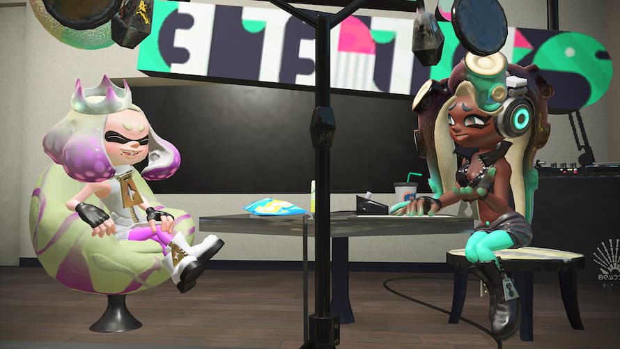 Pearl and Marina enjoy a conversation while sitting in their studio.